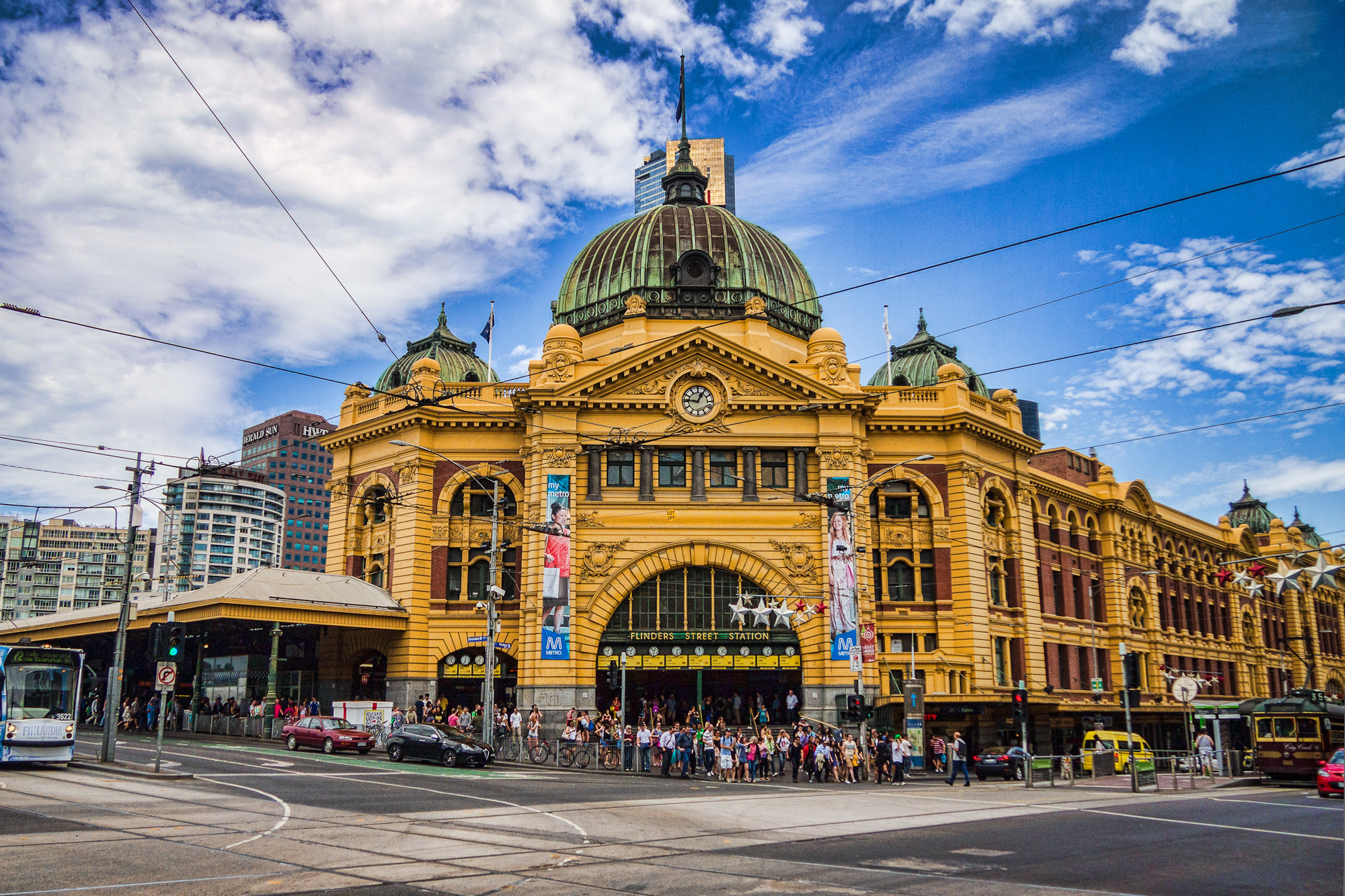 Flinders Street Station in Melbourne. Designed by James Fawcett and H. P. C. Ashworth in 1899, over 110,000 commuters and 1,500 trains pass through the station every weekday.